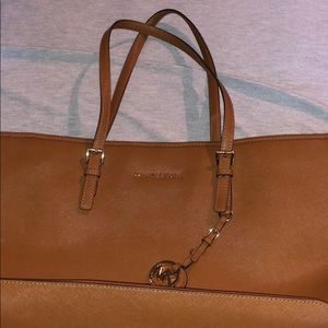 Michael Kors tote with protected laptop sleeve.